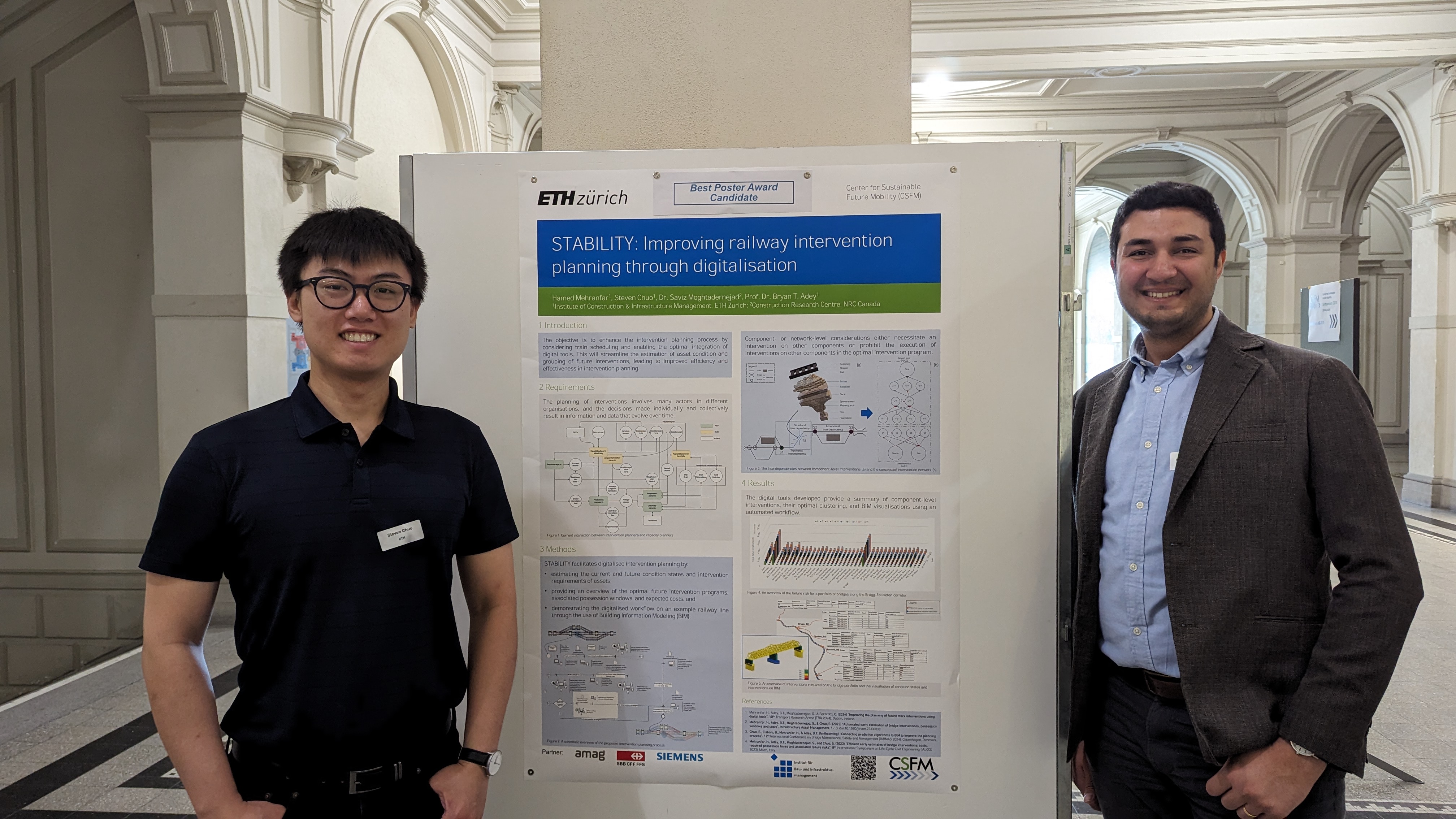 Steven Chuo and Hamed Mehranfar in front of their poster